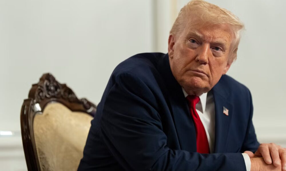 Trump tells airlines to consider Venezuela’s airspace closed as US military buildup continues in region