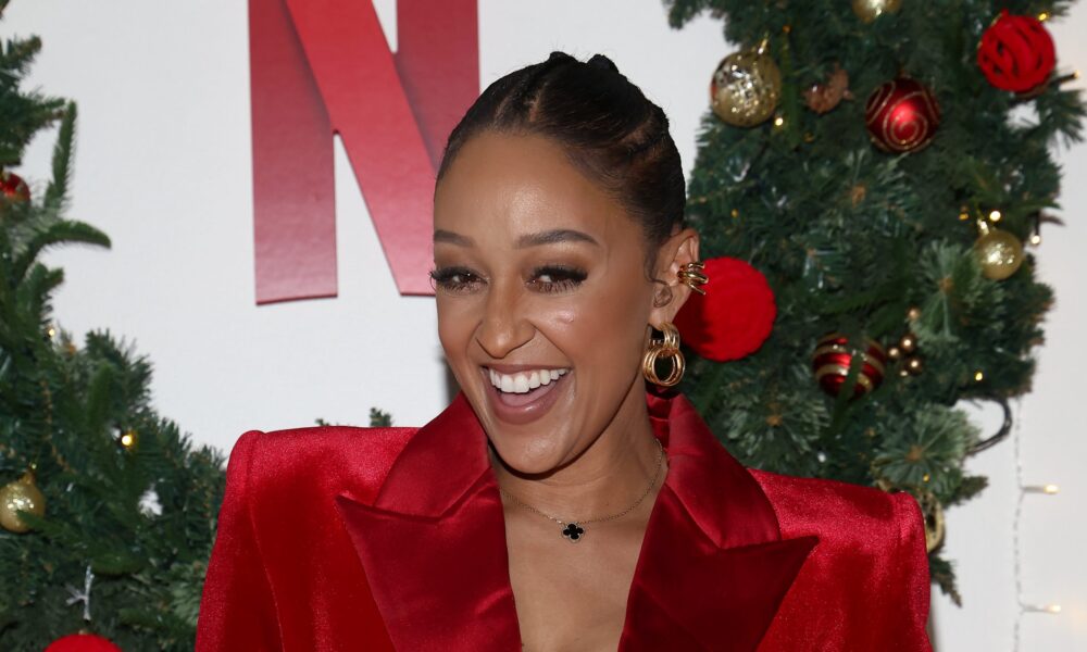 Tia Mowry Sparks Questions Mystery Man Hand Appears In Selfie Photo Cory Hardrict