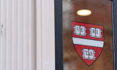 Logo of Harvard University on a window