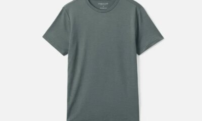 Merino wool dusty teal t-shirt on a light gray background
