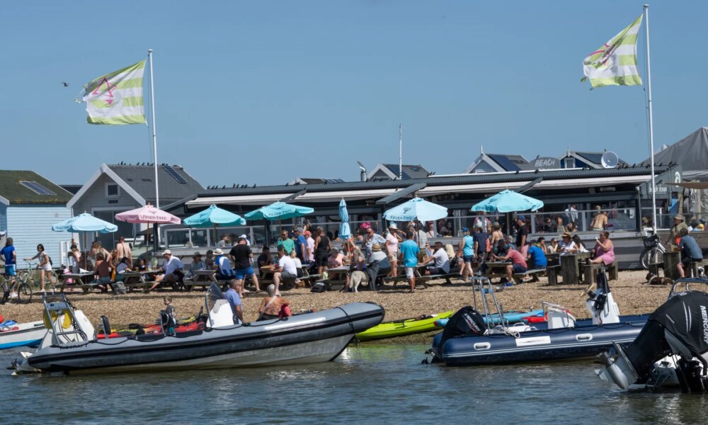 Fuming beach hut owners win fight against ‘unbearable’ restaurant 'turning seaside town into Ibiza & Magaluf rave scene'