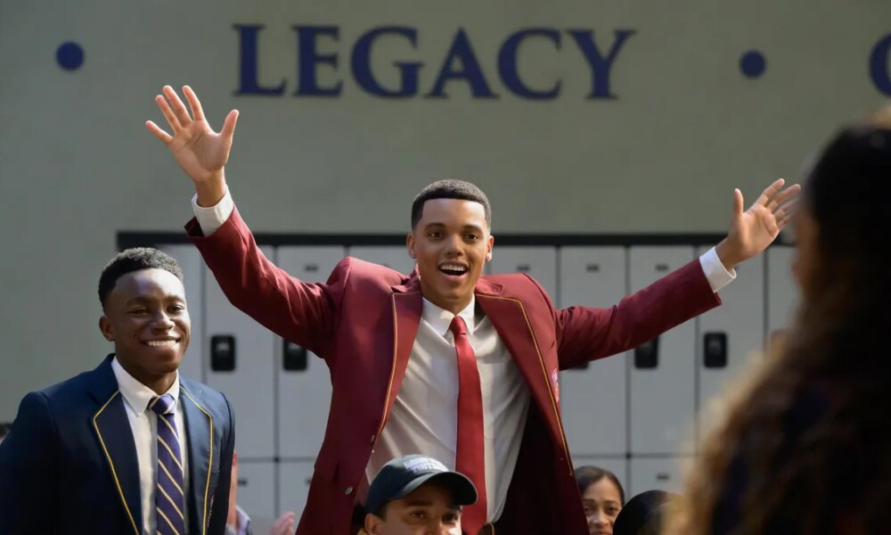 two young men celebrate at private school