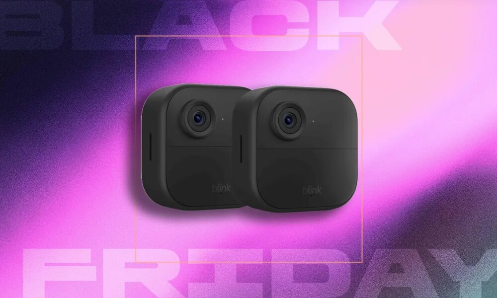 two small, black square security camera devices against a pink and black gradient with the text "BLACK FRIDAY" in the background