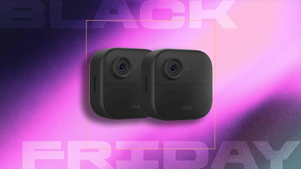 two small, black square security camera devices against a pink and black gradient with the text "BLACK FRIDAY" in the background