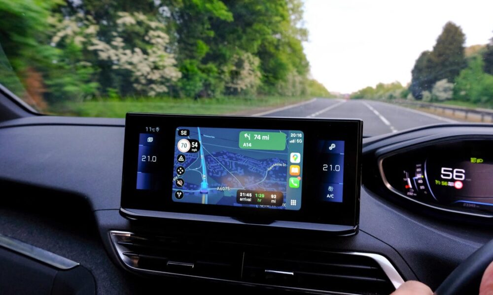 A Road trip or commute with the view out of the windscreen from the drivers perspective with Sat Nav google maps.