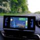 A Road trip or commute with the view out of the windscreen from the drivers perspective with Sat Nav google maps.