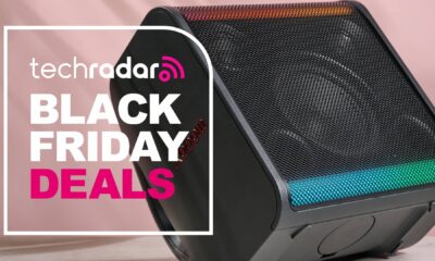 LG xboom Stage 301 on pink background with the words &#039;TechRadar: Black Friday deals&#039; on left side of the image