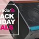 LG xboom Stage 301 on pink background with the words &#039;TechRadar: Black Friday deals&#039; on left side of the image