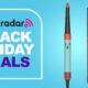 Dyson Airwrap i.d and Airwrap Origin on a blue TechRadar Black Friday deals background