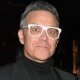 Robbie Williams steps out in chunky white specs after claiming fat jabs are ruining his eyesight