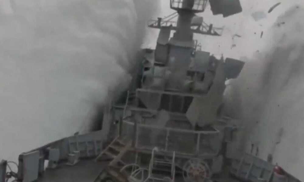 Stunning moment Nato submarine torpedoes frigate in exercise as ship erupts into the air & containers fall off