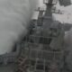 Stunning moment Nato submarine torpedoes frigate in exercise as ship erupts into the air & containers fall off