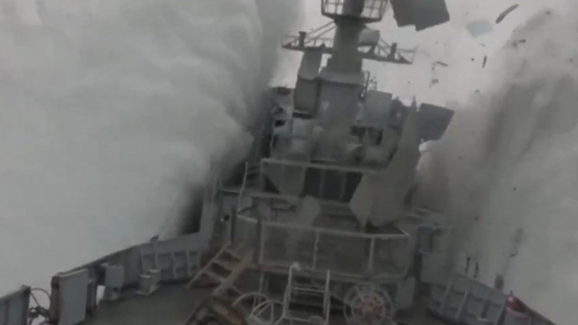 Stunning moment Nato submarine torpedoes frigate in exercise as ship erupts into the air & containers fall off