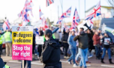 Anti-immigration and anti-racism demonstrators line the streets of Portsmouth in opposing marches