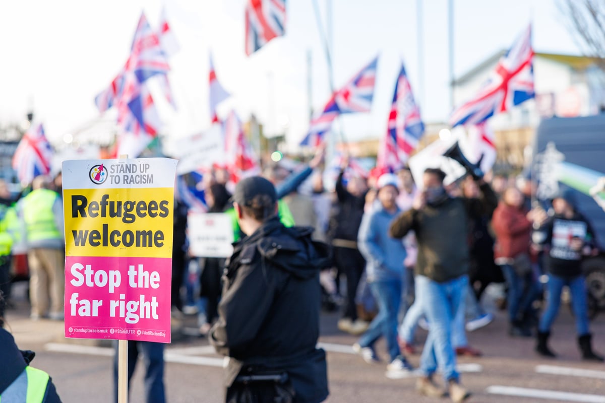 Anti-immigration and anti-racism demonstrators line the streets of Portsmouth in opposing marches
