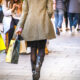 A,Shopping,High,Street,Scene,With,Woman,Carrying,Shopping,Bag