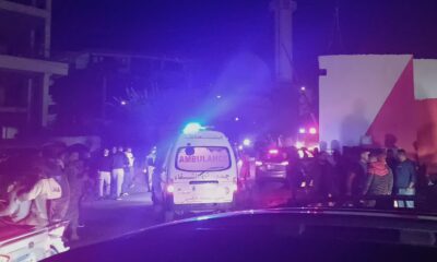 People gathered next to an ambulance as it entered the Ein el-Hilweh refugee camp. Pic: AP