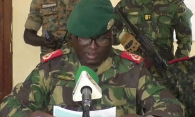 Dinis N'Tchama, military spokesperson, announces the coup on television. Pic: TGB Guinea-Bissau/AP