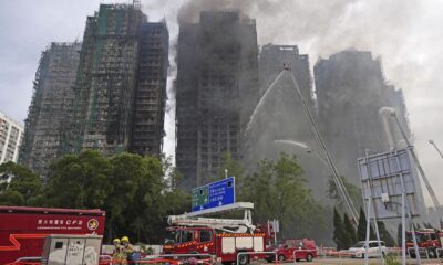Police make arrests over huge Hong Kong flats fire - with dozens killed and more still missing | World News