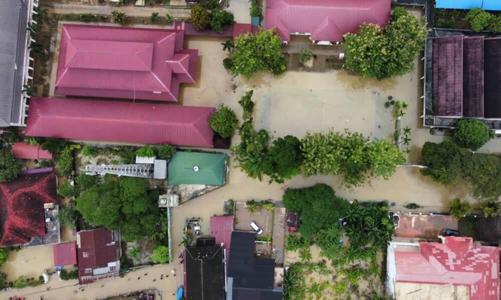 Flooded buildings in Medan, North Sumatra. Pic: AP/ Binsar Bakkara