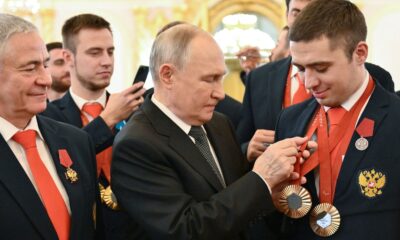 Vladimir Putin with Russian medallists of the Paris 2024 Summer Paralympics. File pic: Reuters
