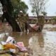 People clean up after flood recedes in Dak Lak on 24 November. Pic: Nguyen Dung/VNA via AP