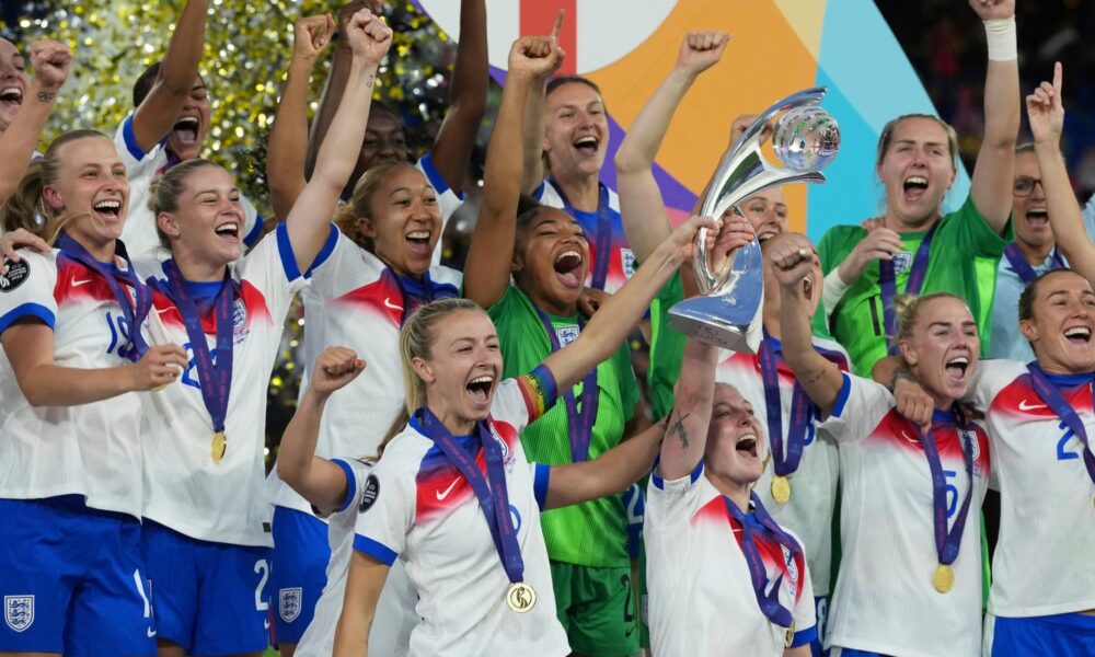 England players celebrate with trophy after winning the Women's Euro 2025 final soccer match between England and Spain