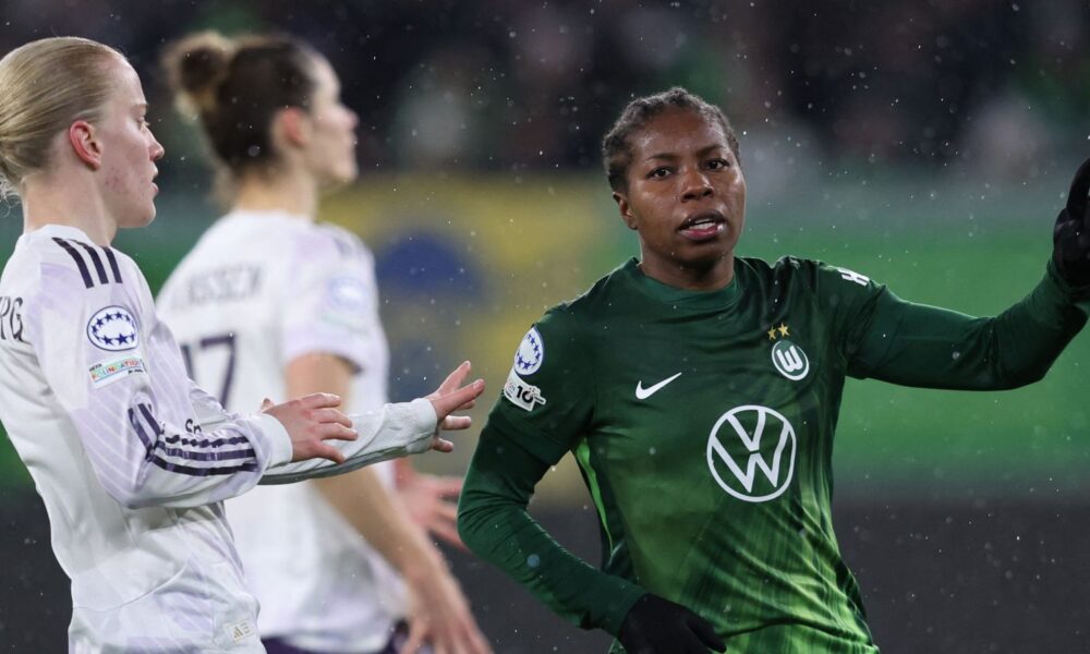 VfL Wolfsburg's forward Lineth Beerensteyn celebrates after scoring their fouth goal against Manchester United