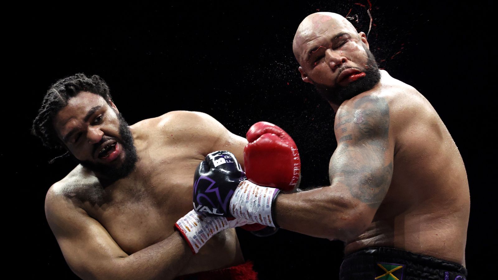 Jeamie TKV beat Frazer CLarke via split decision to win the British heavyweight title