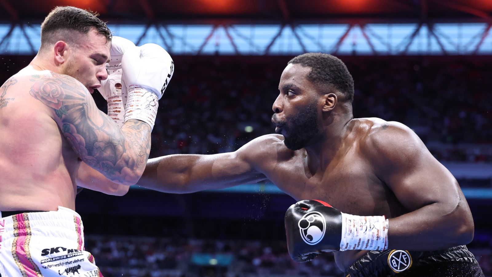 Lawrence Okolie offers to spar Jake Paul to 'help him' for Anthony Joshua | 'Maybe he’s got a secret' | Boxing News