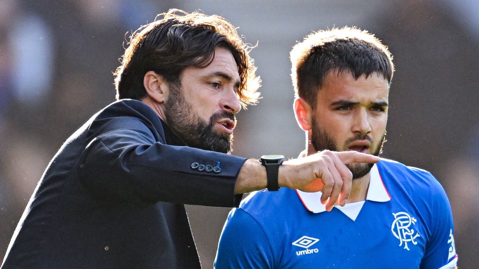 GLASGOW, SCOTLAND - AUGUST 09: Rangers&#39; Nicolas Raskin (R) with Head Coach Russell Martin as he is substituted on during a William Hill Premiership match between Rangers and Dundee at Ibrox Stadium, on August 09, 2025, in Glasgow, Scotland. (Photo by Rob Casey / SNS Group)