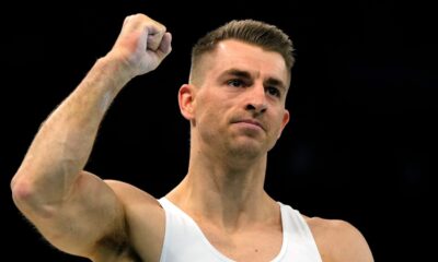 Max Whitlock, of Britain, celebrates after performing on the pommel horse during the men's artistic gymnastics team finals round at Bercy Arena at the 2024 Summer Olympics, Monday, July 29, 2024, in Paris, France. (AP Photo/Charlie Riedel)