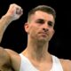 Max Whitlock, of Britain, celebrates after performing on the pommel horse during the men's artistic gymnastics team finals round at Bercy Arena at the 2024 Summer Olympics, Monday, July 29, 2024, in Paris, France. (AP Photo/Charlie Riedel)