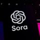 The Sora logo displays on a smartphone screen
