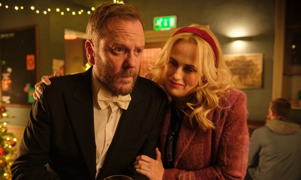 Kiefer Sutherland Leads a Great British Holiday Tradition in This Meta Comedy
