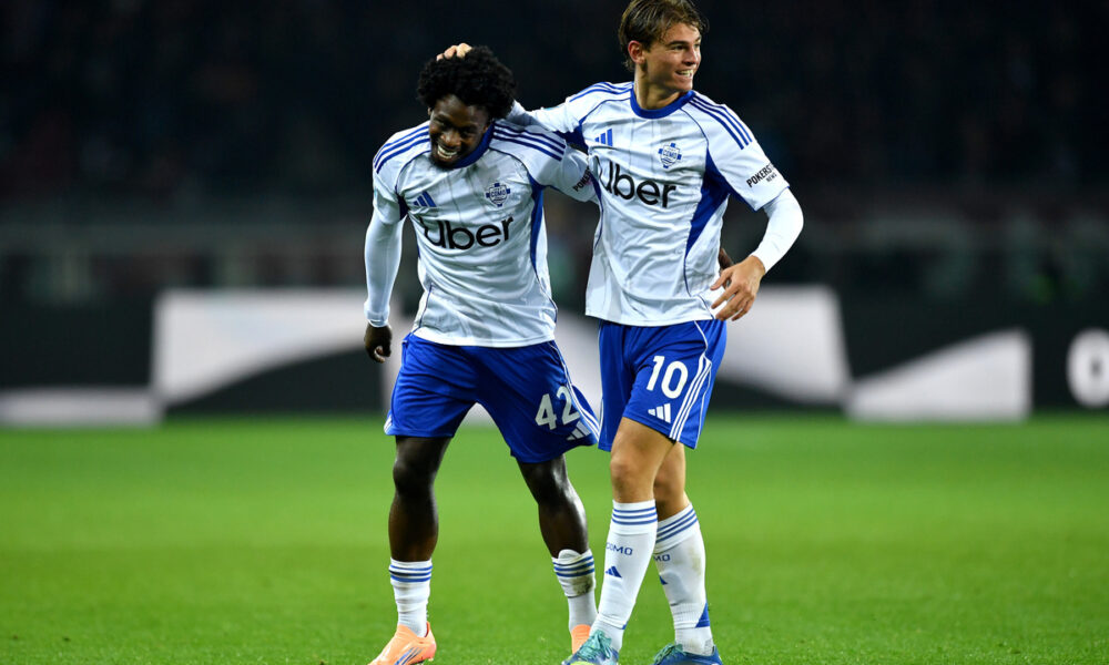 TURIN, ITALY - NOVEMBER 24: Jayden Addai (L) of Como 1907 celebrates with teammate Nico Paz (R) after scoring his team
