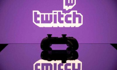 Twitch logo reflection with a controller
