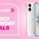 Apple iPhone 17 on pink background with TechRadar Cyber Monday deals text overlay