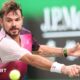 Stan Wawrinka of Switzerland competes against Fabian Marozsan of Italy