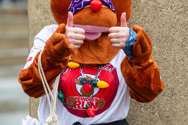 The best pictures as elves and Santas run through Cardiff
