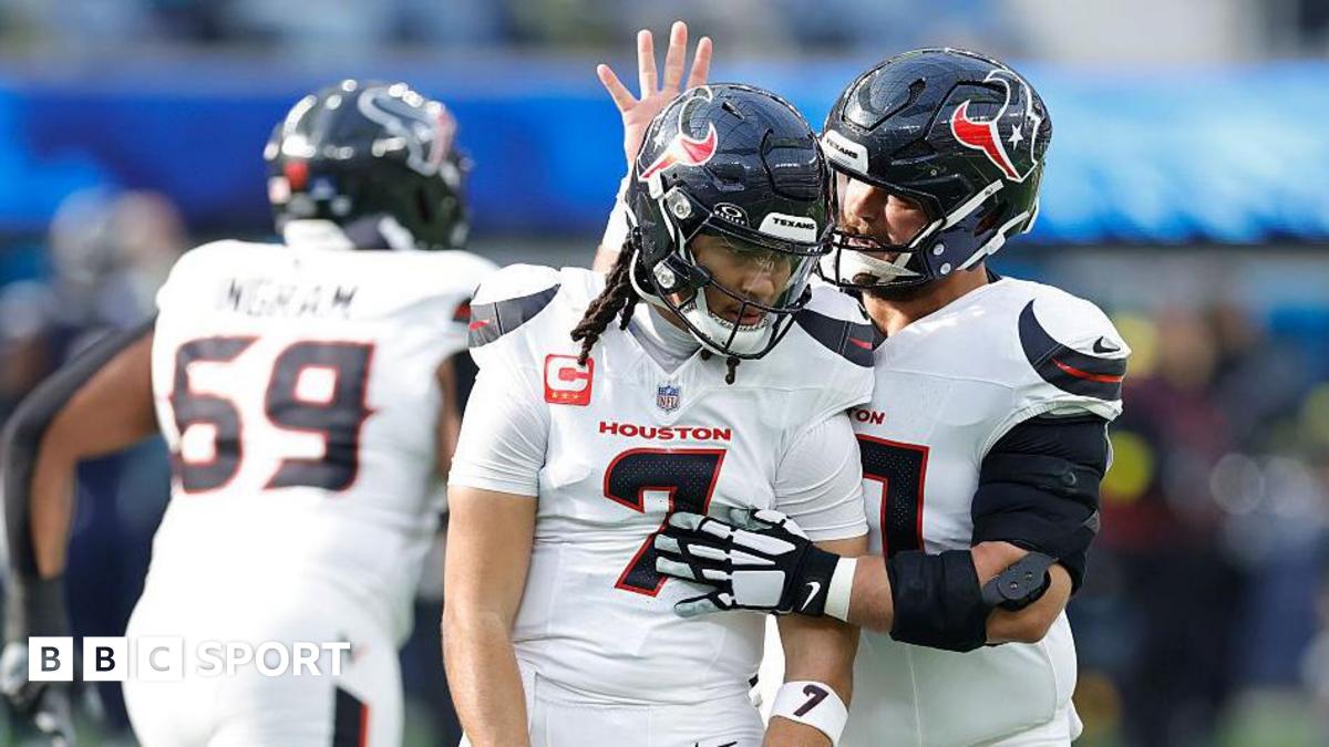 CJ Stroud celebrates a touchdown pass with Jake Andrews of the Houston Texans during the first quarter against the Los Angeles Chargers