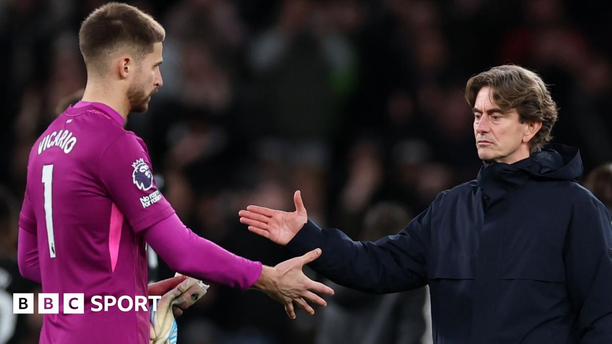 Thomas Frank, Manager of Tottenham Hotspur, shakes hands with Guglielmo Vicario