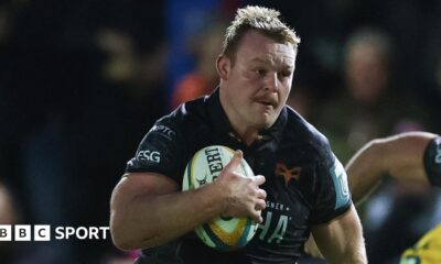 Ospreys' Dewi Lake runs with the ball in his right hand