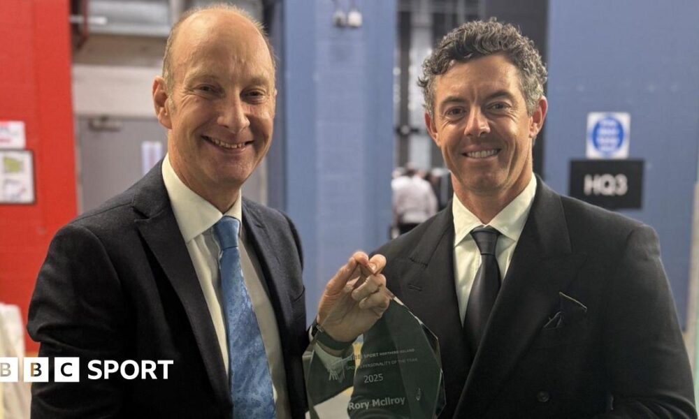 Stephen Watson presents the BBC NI Sports Personality of the Year award to Rory McIlroy