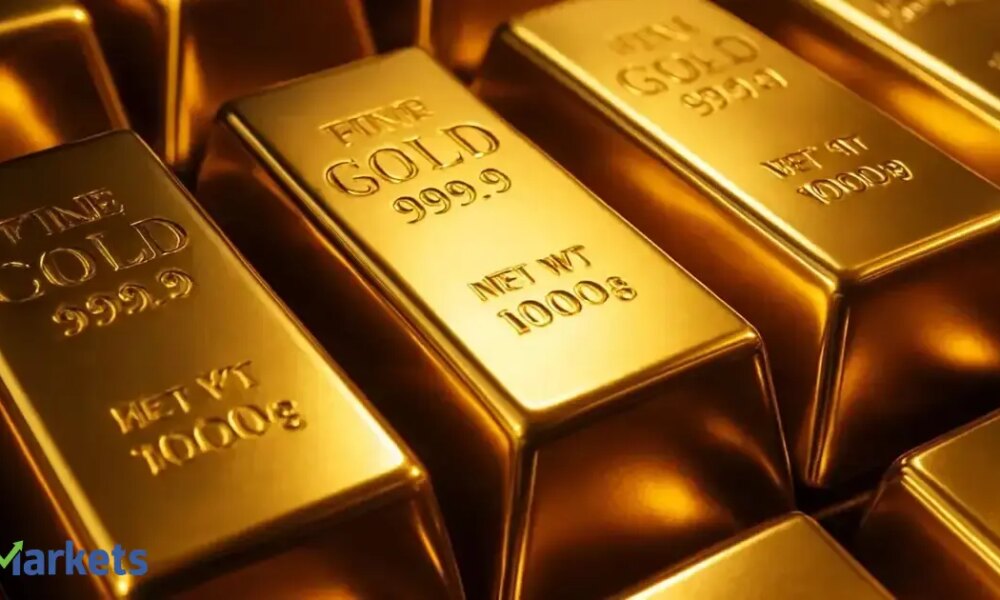 Gold edges lower as investors book profits