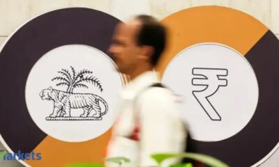 Rupee hits record low on feeble foreign flows, drawing RBI to defend 90 level