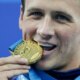 Lochte auctions three Olympic golds and announces memoir: "I became the most hated person in the world"