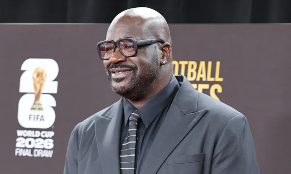 Shaquille O'Neal breaks through a wall, and they call it the NBA Christmas show