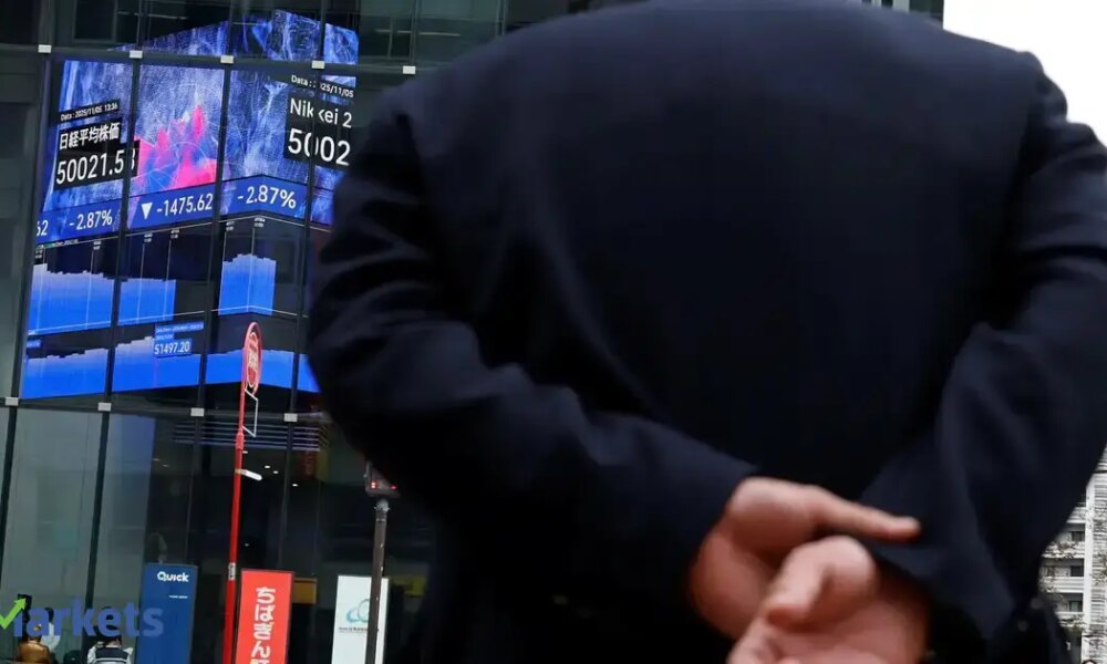 Japan's Topix gauge touches record high on easing debt concerns