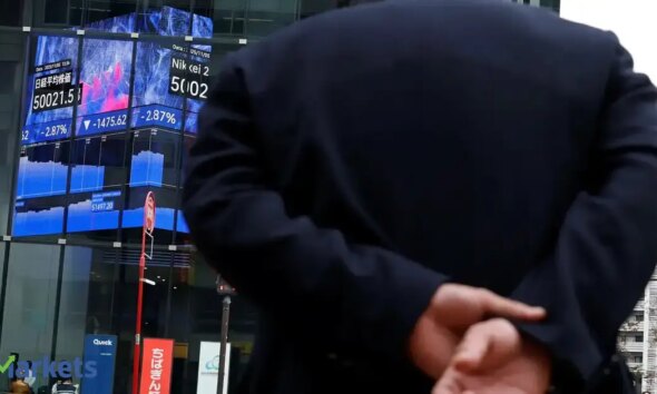 Japan's Topix gauge touches record high on easing debt concerns